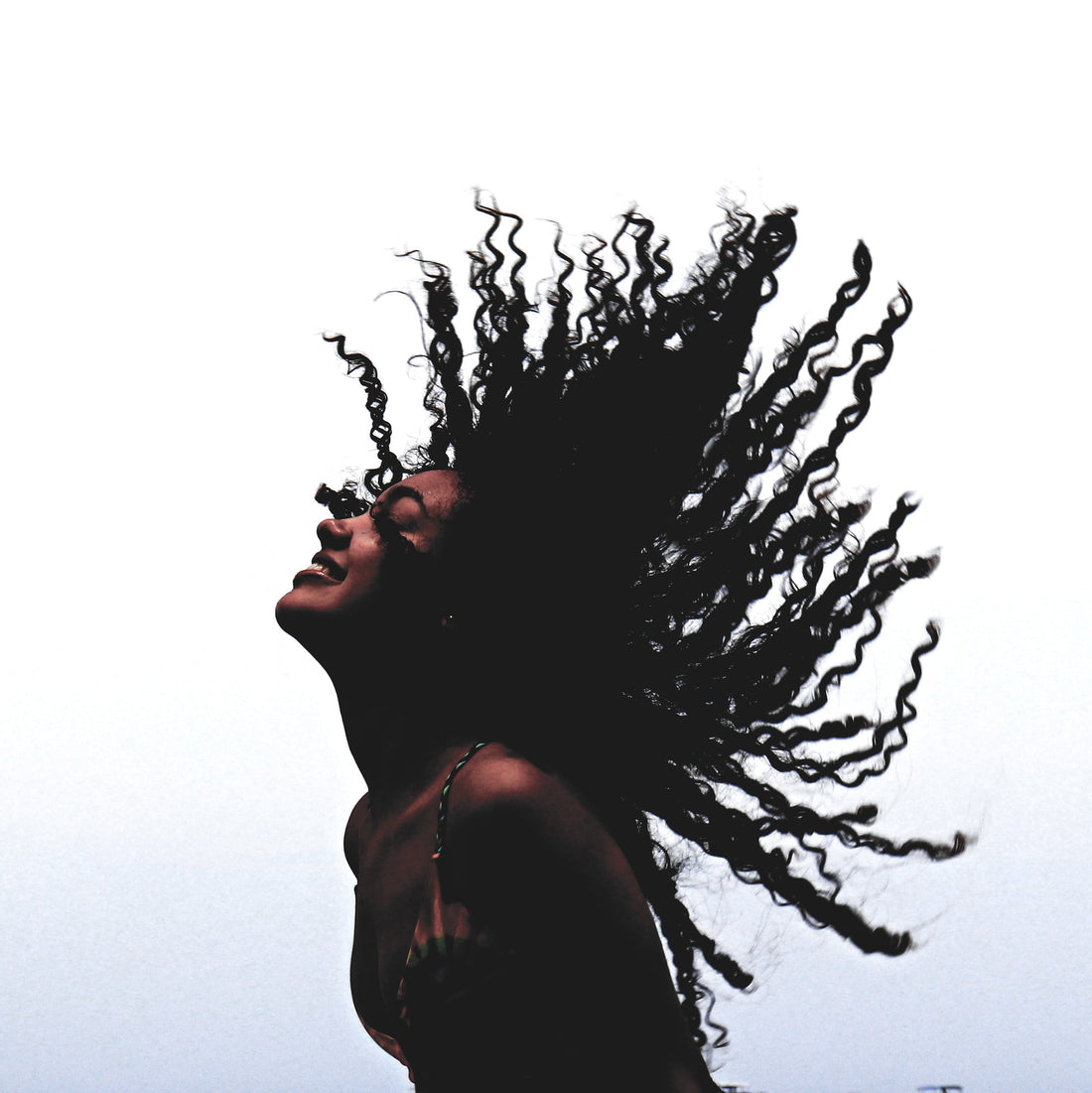 Woman Flipping Hair Photo By Adrian Fernández