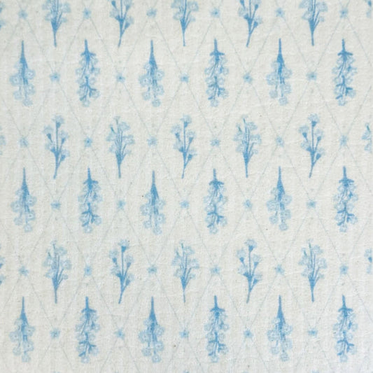 White cloth with blue floral pattern on a swedish dishcloth