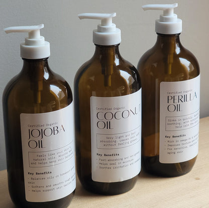 1 litre amber bottles of jojoba, coconut and perilla oil